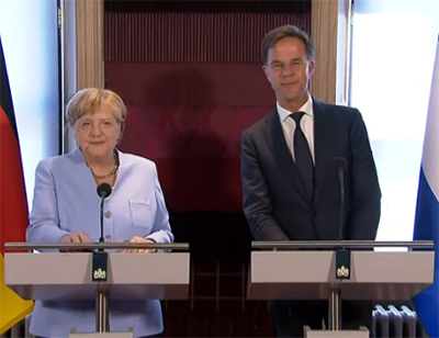Merkel en Rutte leren van elkaars klimaatbeleid 